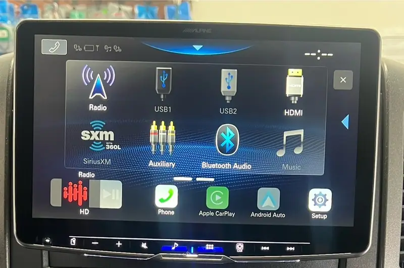 Alpine touchscreen receiver with Apple CarPlay and Android Auto in a Mercedes Sprinter dash