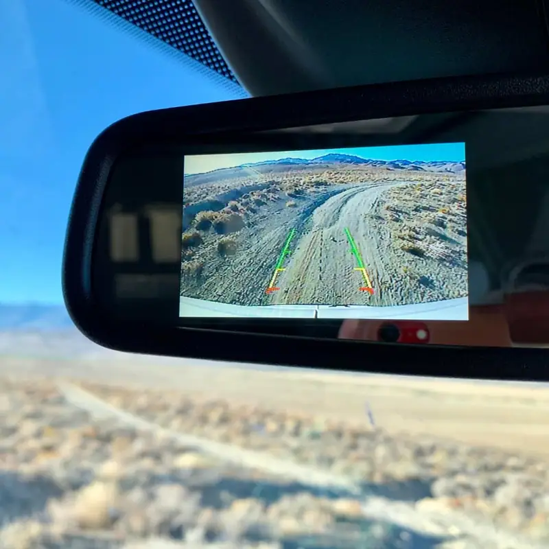 Rearview mirror screen showing a backup camera image