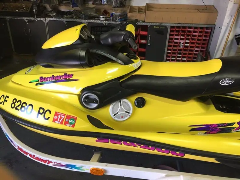Yellow jet ski with an upgraded audio system