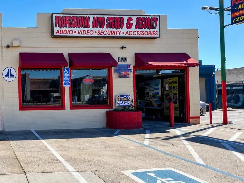 Manteca store entrance with a Viper alarms poster in the doorway